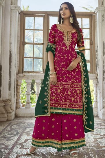 Embroidered Rani Color Wedding Wear Palazzo Salwar Suit In Georgette Fabric