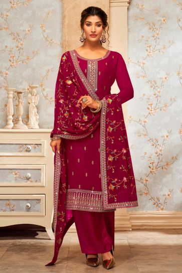 Dazzling Georgette Fabric Rani Color Embroidered Palazzo Suit