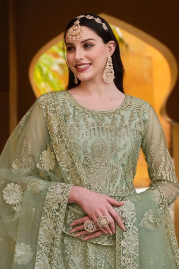 Net Fabric Sea Green Color Supreme Party Style Anarkali Suit