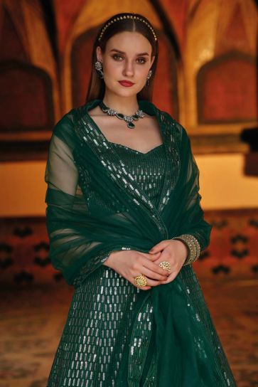 Dark Green Color Net Fabric Sangeet Wear Majestic Sequins Work Lehenga