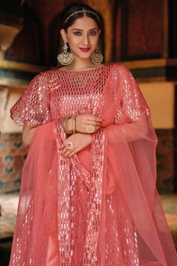 Net Fabric Sangeet Wear Precious Sequins Work Lehenga In Peach Color