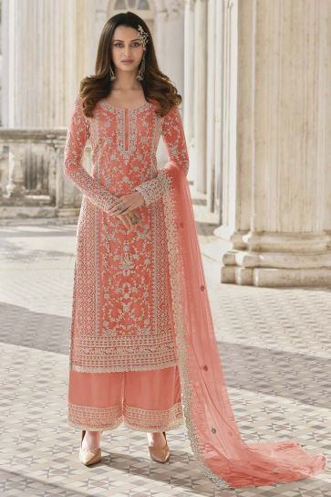 Exquisite Embroidered Work Net Fabric Party Wear Palazzo Suit In Peach Color