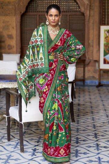 Glamorous Art Silk Fabric Dark Green Color Patola Printed Saree