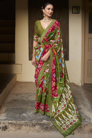 Fascinating Mehendi Green Color Art Silk Fabric Patola Printed Saree