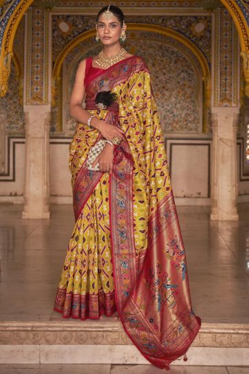 Riveting Patola Printed On Art Silk Fabric Saree In Yellow Color