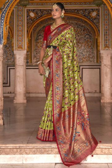 Patola Printed On Mehendi Green Color Adorning Saree In Art Silk Fabric