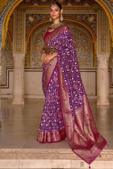 Intricate Patola Printed Art Silk Fabric Purple Color Saree