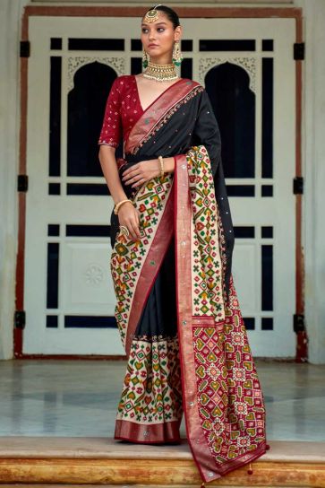 Patola Printed Flamboyant Art Silk Fabric Saree In Black Color