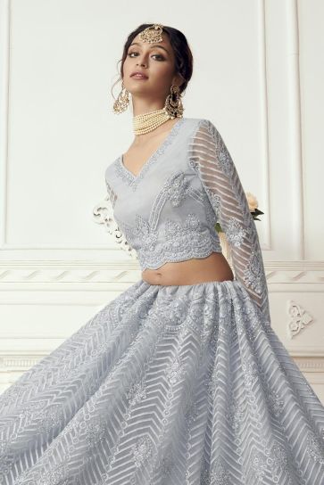 Trendy Sangeet Wear Lehenga Choli In Grey Color Net Fabric