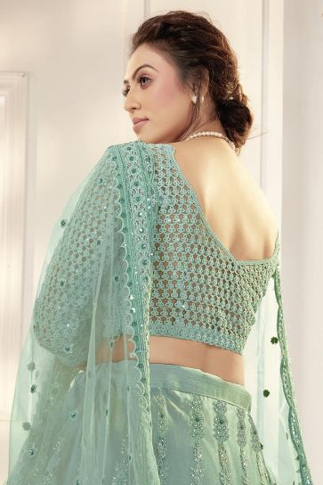 Trendy Heavy Net Fabric Sea Green Color Blazing Lehenga With Embroidered Work