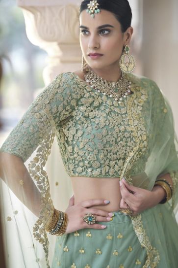 Net Fabric Embroidered Wedding Lehenga In Sea Green Color