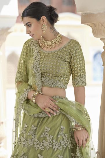 Net Fabric Embroidered Sangeet Wear Lehenga Choli In Green Color