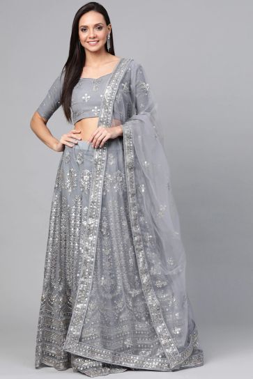 Grey Color Net Fabric Fancy Sequins Work Sangeet Wear Lehenga Choli