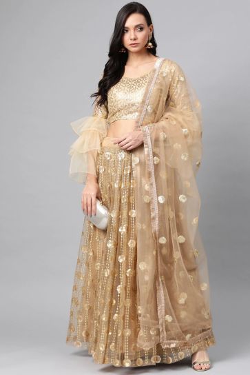 Sangeet Wear Beige Color Sequins Work Lehenga Choli In Net Fabric