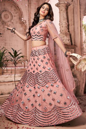 Wedding Wear Net Fabric Fancy Work Lehenga Choli In Peach Color