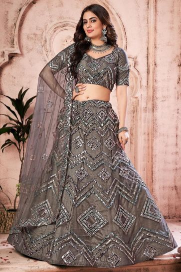 Wedding Wear Dark Beige Color Net Fabric Fancy Work Lehenga Choli
