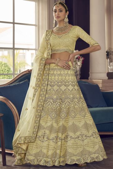 Attractive Crepe Fabric Thread Embroidered Sangeet Wear Designer Lehenga Choli In Yellow Color