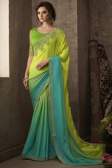 Cyan Color Fancy Chiffon Silk Fabric Party Wear Saree With Embroidered Blouse