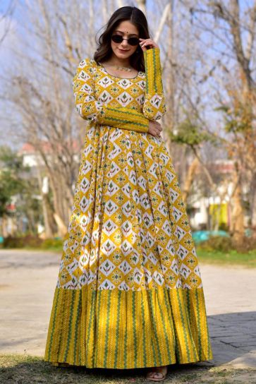 Party Wear Mustard Color Fashionable Printed Long Gown In Fancy Fabric 