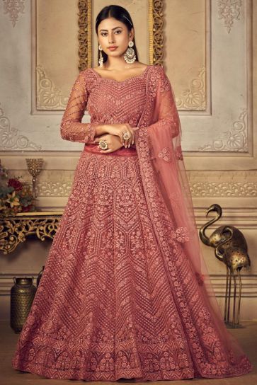 Peach Color Wedding Wear Attractive Embroidered Lehenga Choli In Net Fabric