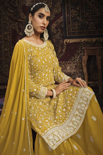 Party Wear Yellow Color Palazzo Salwar Suit In Georgette Fabric