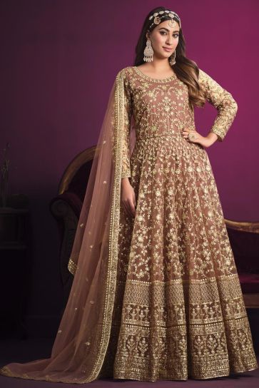 Net Fabric Peach Color Embroidered Winsome Anarkali Suit