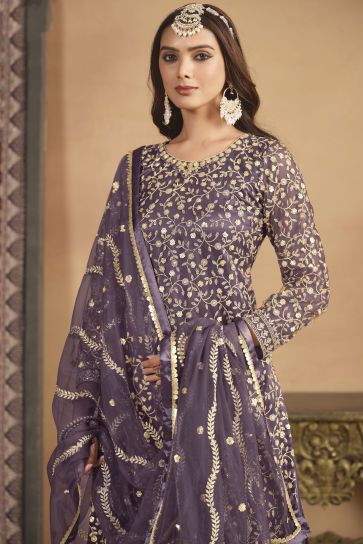 Festive Wear Flamboyant Net Fabric Palazzo Suit In Purple Color