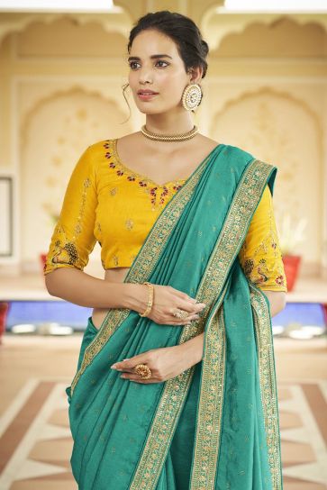 Imperial Sea Green Color Fancy Fabric Saree With Border Work