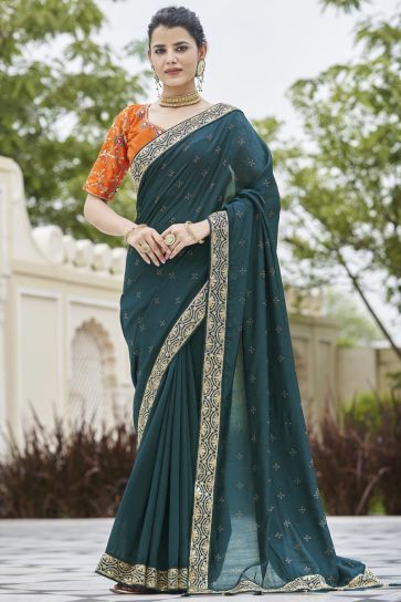 Border Work On Awesome Fancy Fabric Saree In Teal Color