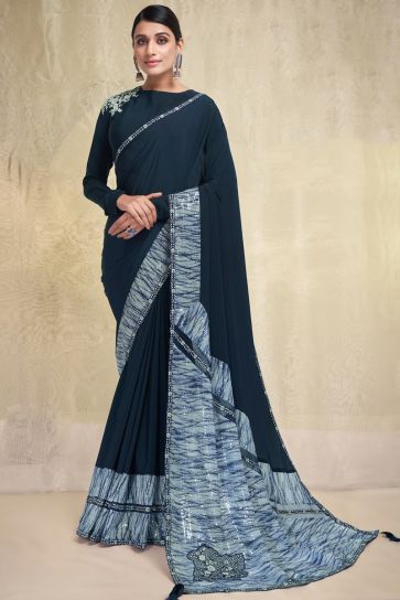 Teal Color Crepe Fabric Saree With Imposing Sequins Work