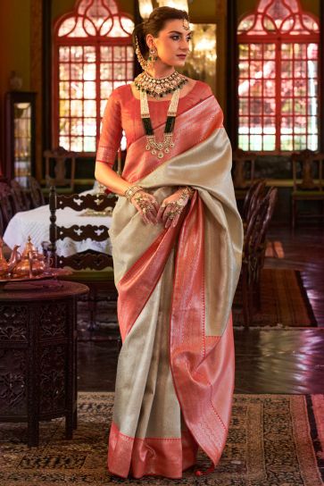 Cream Color Kanjivaram Silk Fabric Coveted Saree With Weaving Work