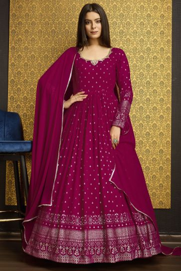 Glorious Function Wear Rani Color Foil Work Georgette Readymade Gown With Dupatta