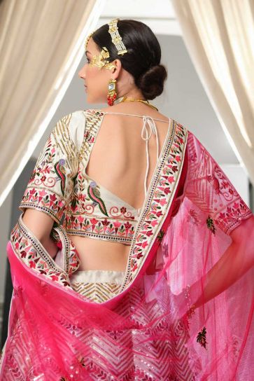 Intricate Embroidered Silk Fabric Off White Color Wedding Wear Lehenga