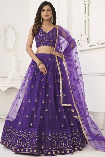 Purple Color Net Fabric Traditional Lehenga With Sequins Embroidered Work
