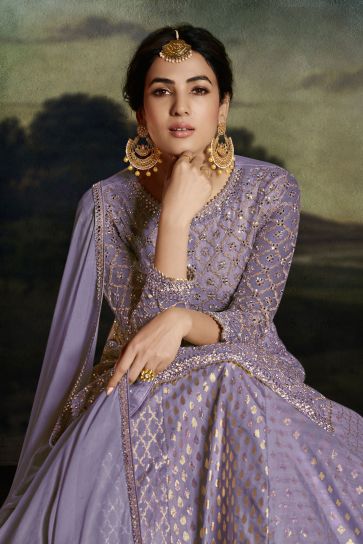 Sonal Chauhan Imperial Lavender Color Net Fabric Sharara Top Lehenga With Embroidered Work