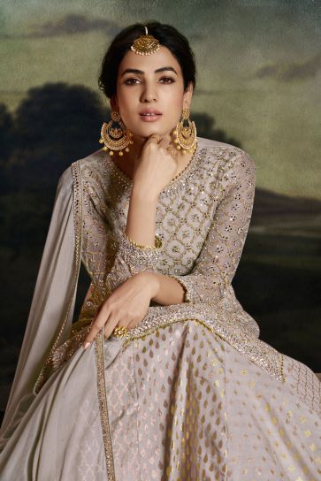 Sonal Chauhan Beige Color Fantastic Net Fabric Sharara Top Lehenga With Embroidered Work