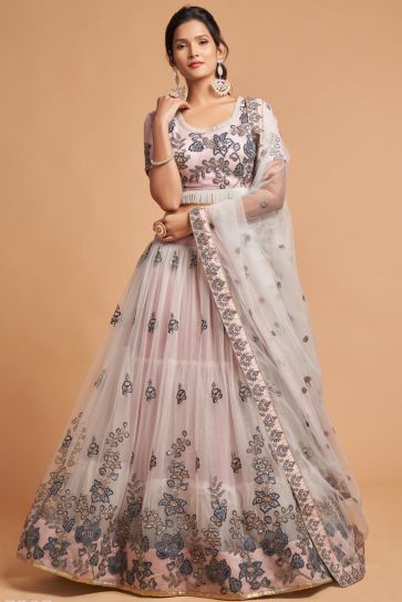 Sangeet Wear Net Fabric Classic Peach Color Lehenga With Embroidered Designs