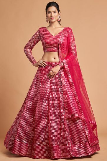 Admirable Net Fabric Embroidered Work Rani Color Lehenga In Sangeet Wear
