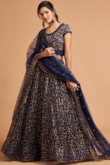 Sangeet Wear Navy Blue Color Net Fabric Mesmeric Lehenga With Embroidered Work