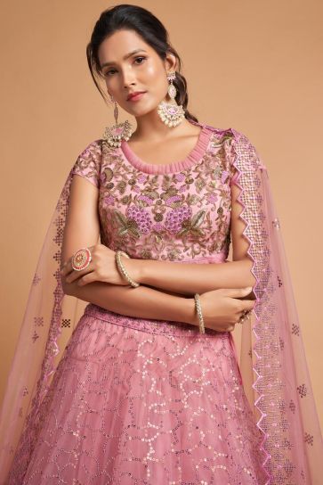 Embroidered Work Pink Color Net Fabric Divine Lehenga In Sangeet Wear