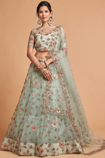 Sea Green Color Alluring Net Fabric Sangeet Wear Lehenga With Embroidered Work