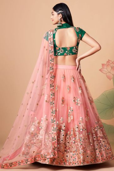 Radiant Sangeet Wear Peach Color Net Fabric Lehenga Choli