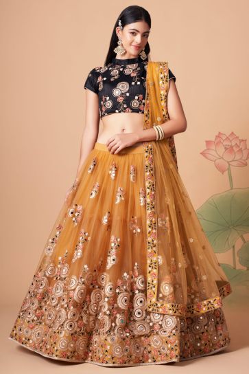 Beguiling Sangeet Wear Golden Color Net Fabric Lehenga Choli
