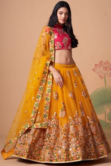 Entrancing Net Fabric Sangeet Wear Lehenga Choli In Yellow Color