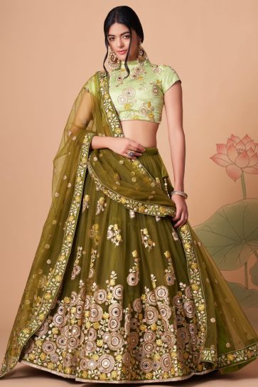 Charming Mehendi Green Color Net Fabric Lehenga Choli In Sangeet Wear