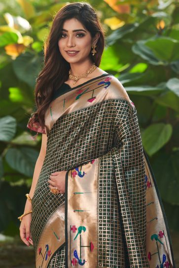 Weaving Work On Superior Paithani Silk Saree In Dark Green Color