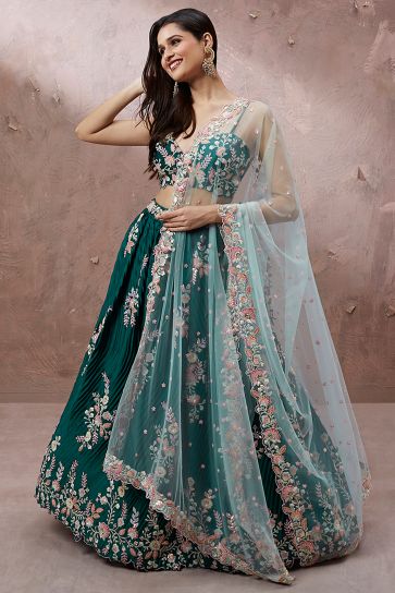 Teal Color Sequins Work Designs Wedding Wear Lehenga And Enigmatic Blouse