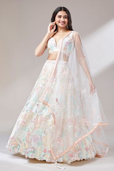 Net Fabric Function Wear Sequins Work Lehenga Choli In Cream Color