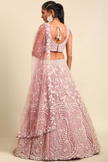 Sequins Work Net Wedding Wear Lehenga In Lavender With Ravishing Blouse