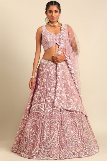 Sequins Work Net Wedding Wear Lehenga In Lavender With Ravishing Blouse